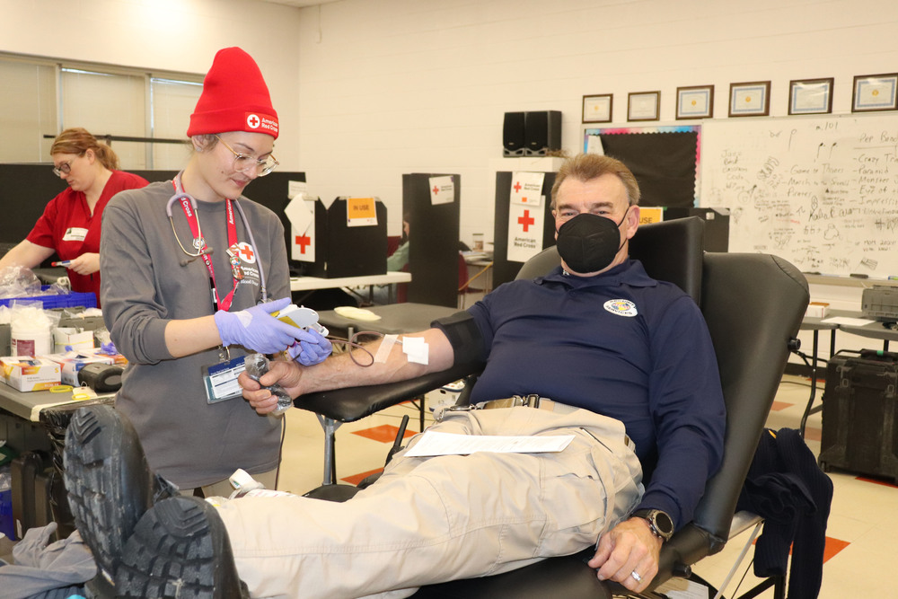 An individual donating blood