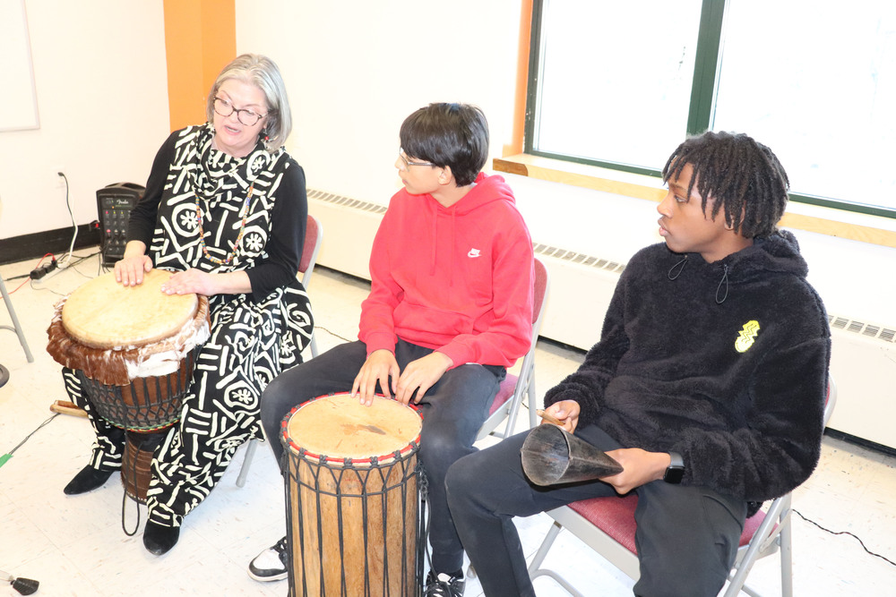 Students get a drum lesson