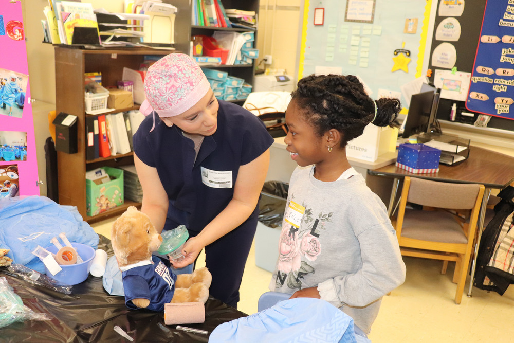 A students speaks with a nurse