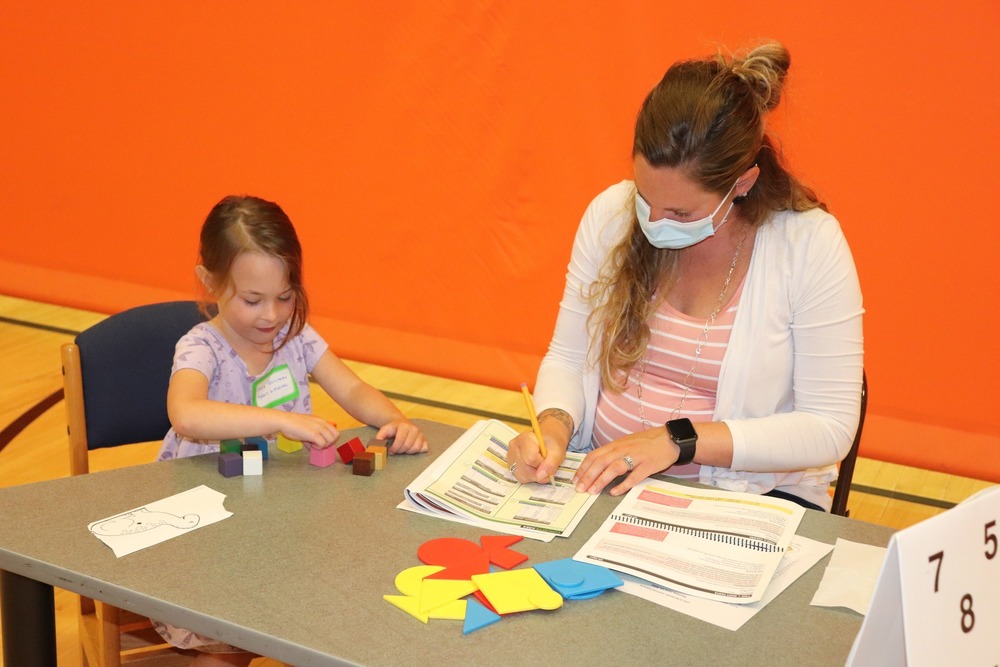 Pre-K students builds with blocks
