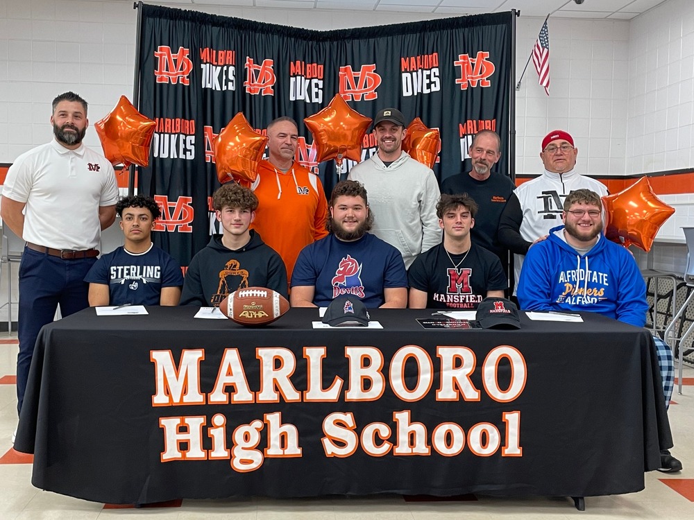 Football players and coaches