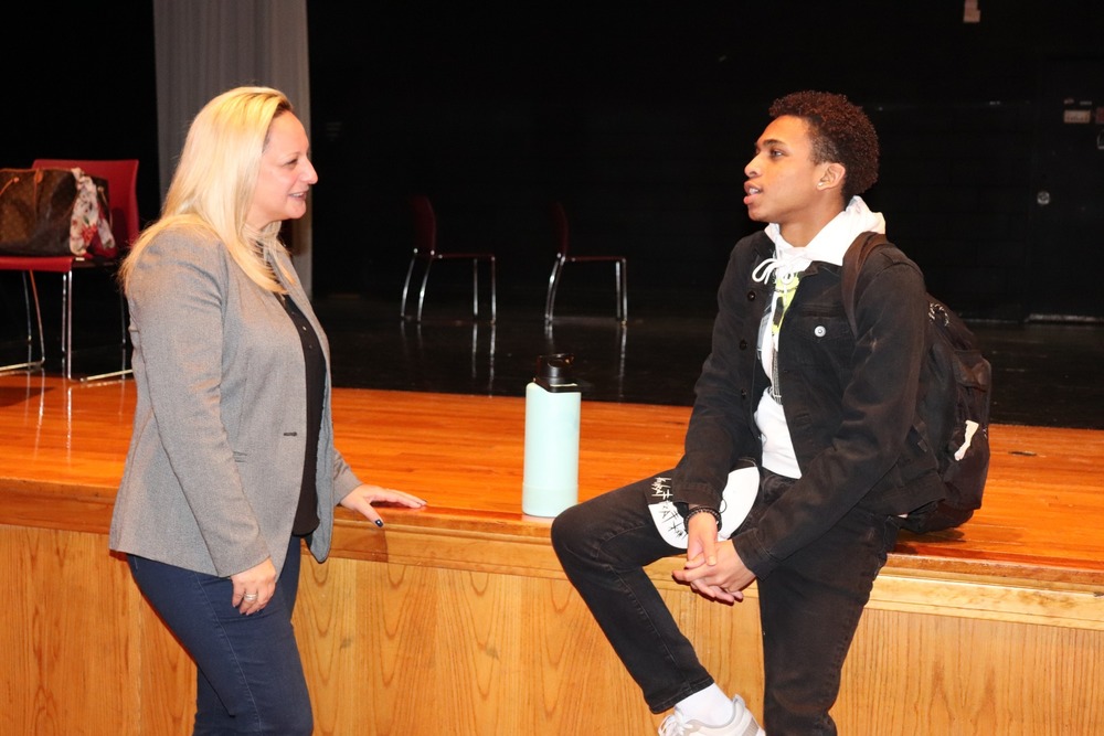 Jacci Grillo speaks to a MHS student.